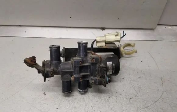 Coolant heater control valve