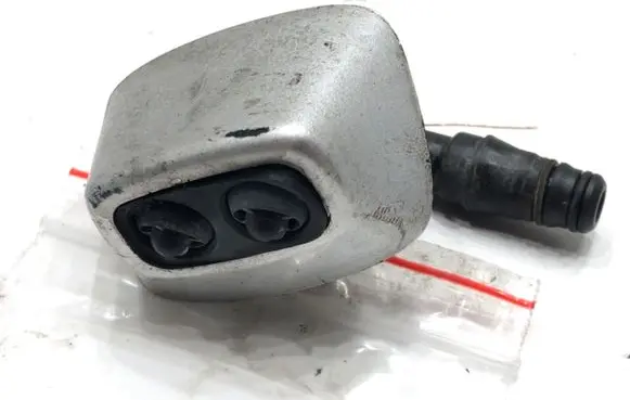 Headlight washer spray nozzle