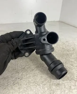 Thermostat/thermostat housing