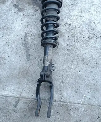 Front shock absorber with coil spring