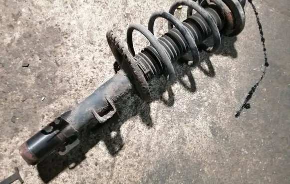 Volkswagen Transporter - Caravelle T5 Front shock absorber with coil spring 7E5413031H 7H0413031N