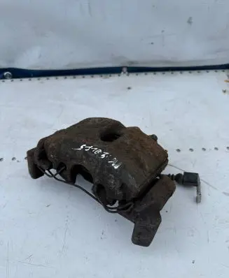 Volkswagen Golf V Front brake caliper