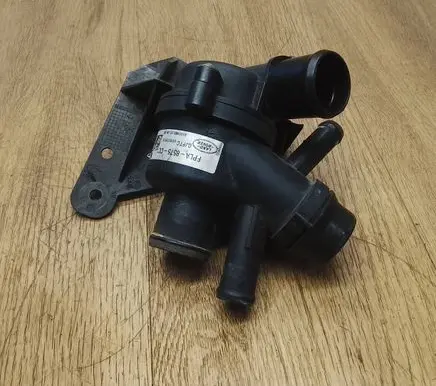 Thermostat/thermostat housing