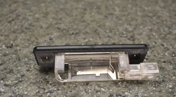 BMW 5 E34 Number plate light 63261378058 24215