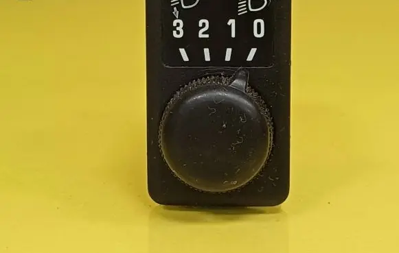 Headlight level height control switch