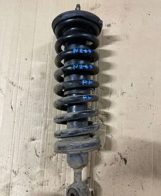 Nissan Navara Front shock absorber with coil spring