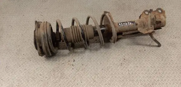 Nissan Tiida C11 Front shock absorber with coil spring 