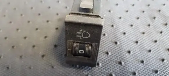 Headlight level height control switch