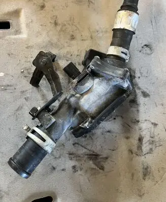 Thermostat/thermostat housing