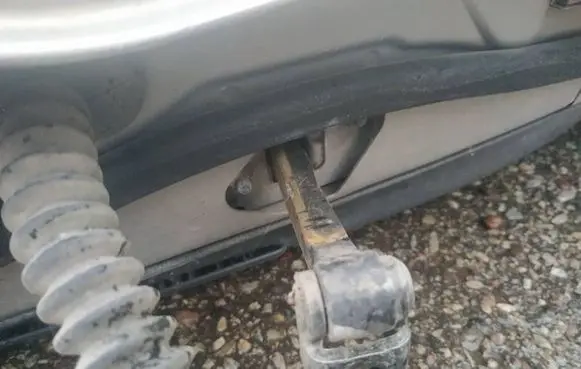 Rear door check strap stopper
