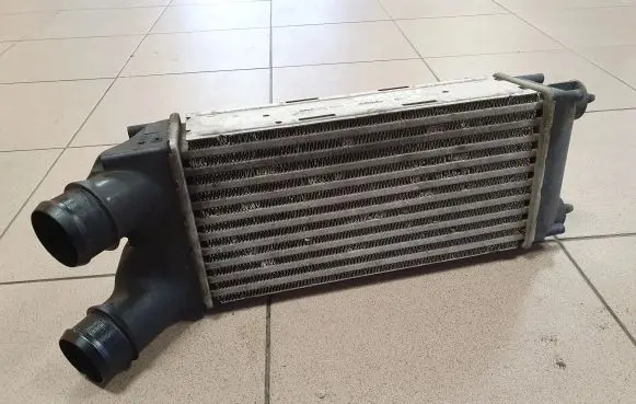 Peugeot Partner Intercooler radiator 9682434580