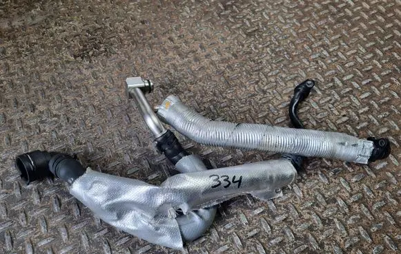 Audi Q3 F3 Engine coolant pipe/hose 06K121065S