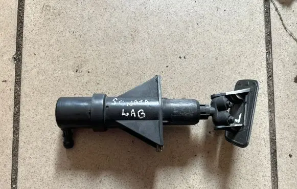 Headlight washer spray nozzle