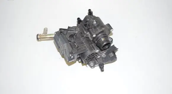 Thermostat/thermostat housing