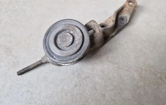 Generator/alternator belt tensioner