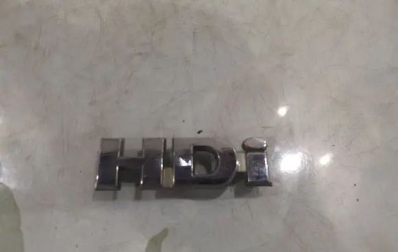 Citroen Berlingo Rear door emblem/model letters 