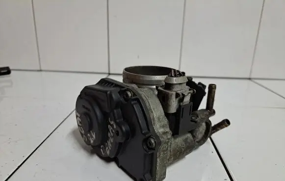 Volkswagen Golf IV Throttle valve 06A133064M 408237111015