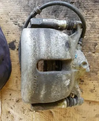 Volkswagen Golf VII Front brake caliper 55221C
