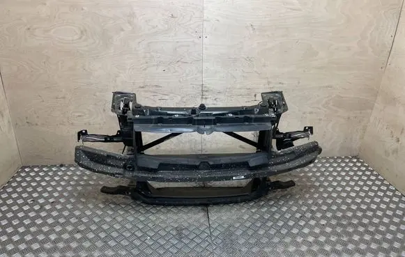 Radiator support slam panel