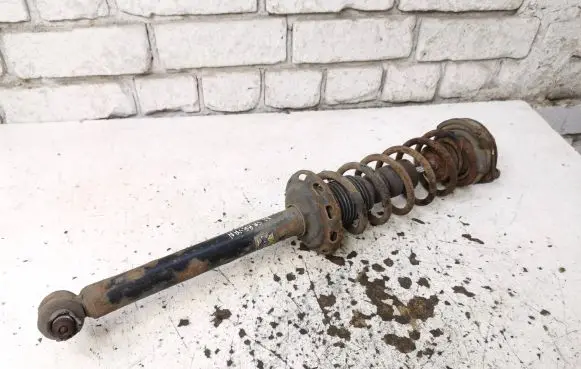 Audi A4 S4 B5 8D Rear shock absorber with coil spring 