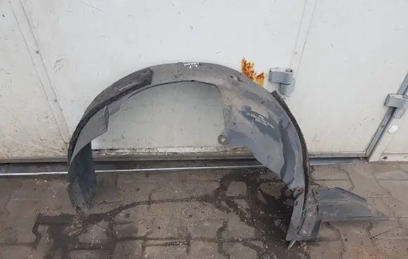 KIA Carens III Front arch 86811A4000