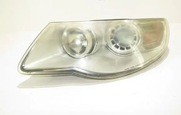 Volkswagen Touareg I Headlight/headlamp 7L6941031A