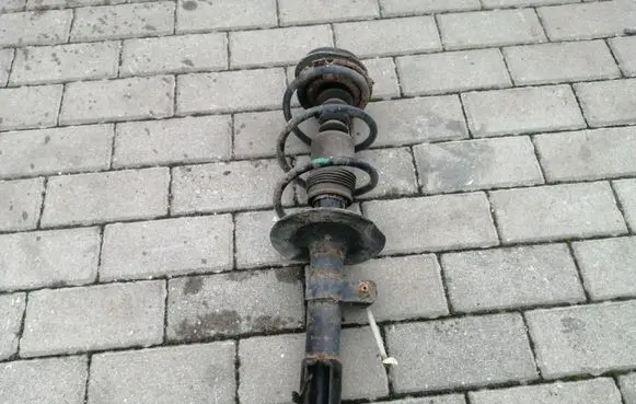Front shock absorber with coil spring