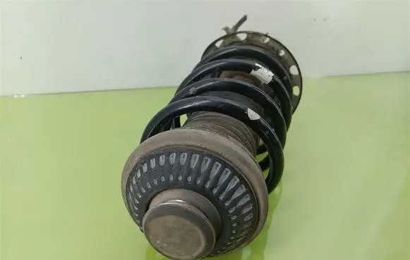 Opel Astra H Front shock absorber with coil spring 