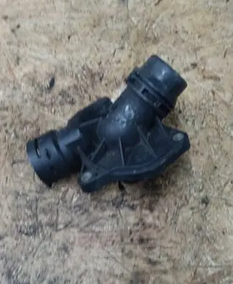 Thermostat/thermostat housing