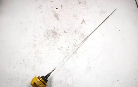 Oil level dip stick