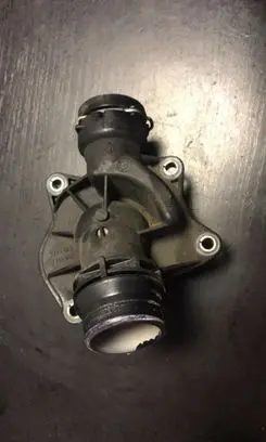 Thermostat/thermostat housing