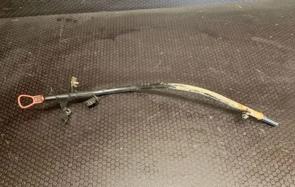 Oil level dip stick