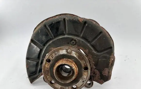 Volkswagen Touran I Front wheel hub spindle knuckle 1K0407256A