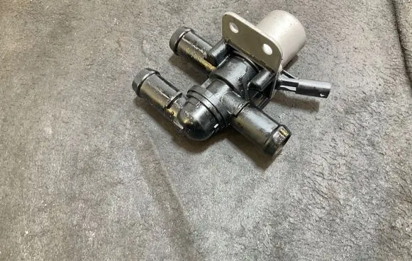Coolant heater control valve