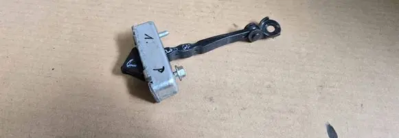 Mazda 6 Front door check strap stopper