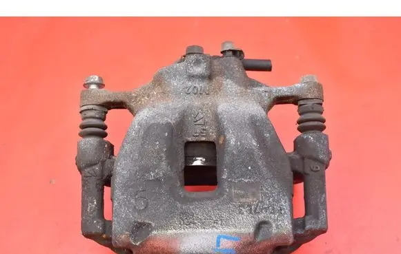 Toyota Corolla E10 Front brake caliper 