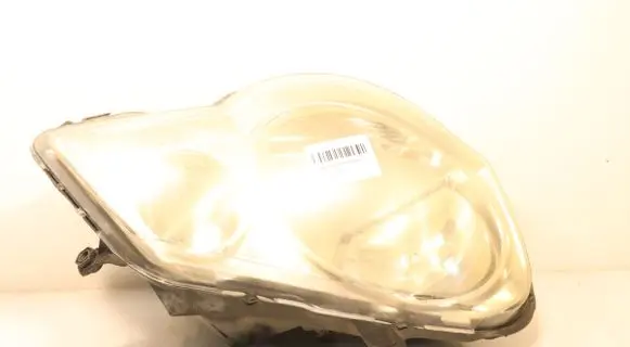 Volkswagen Polo IV 9N3 Headlight/headlamp 89312000