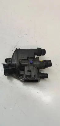 Thermostat/thermostat housing