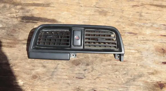 Subaru Impreza II Dash center air vent grill S16405830 E5615161100
