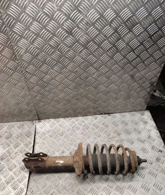 Front shock absorber with coil spring