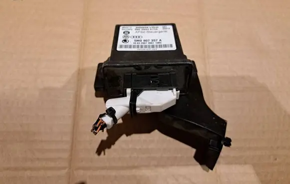 Volkswagen Touran I Light module LCM 5M0907357A 5WK49172A