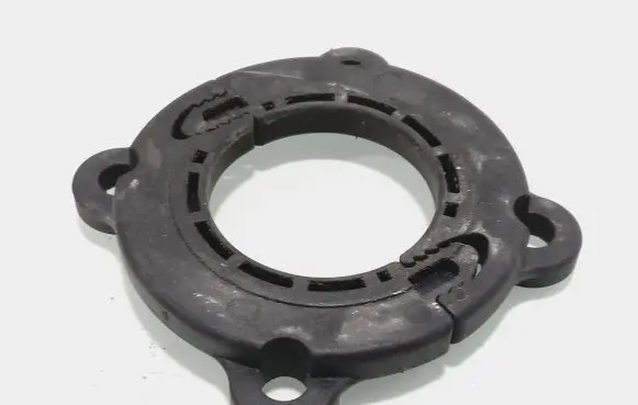 Opel Zafira B Lower shock absorber bracket 