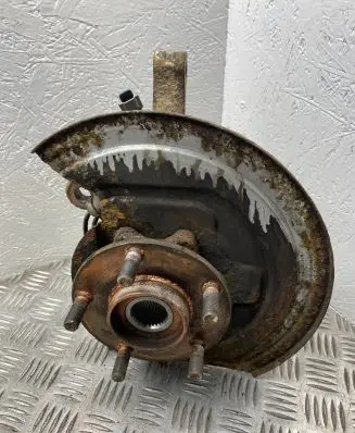 Nissan Juke I F15 Front wheel hub spindle knuckle 400151KK0H