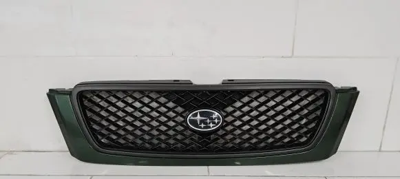 Subaru Forester SF Front bumper upper radiator grill 91065FC090