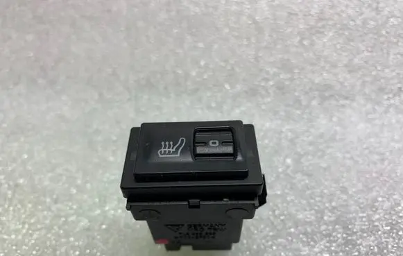 Seat heating switch