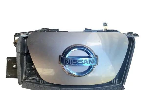 Nissan Leaf I (ZE0) Electric car charge socket cover 657303NL