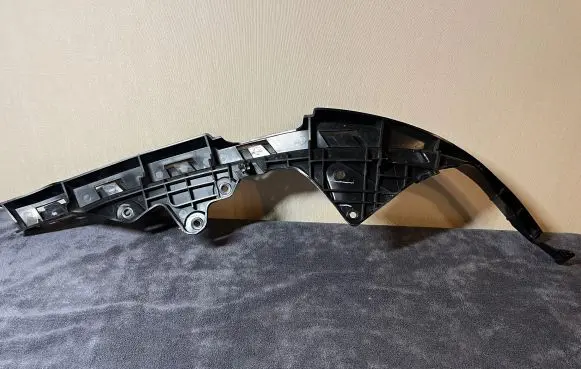 Headlight/headlamp mounting bracket