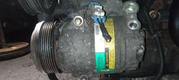 Opel Zafira A Air conditioning (A/C) compressor (pump) 24464152