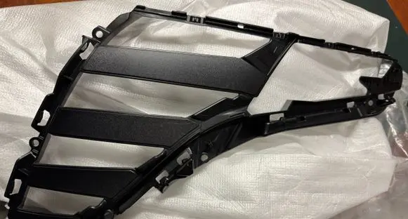 Hyundai Tucson IV NX4 Under headlight/headlamp trim 92157N7400