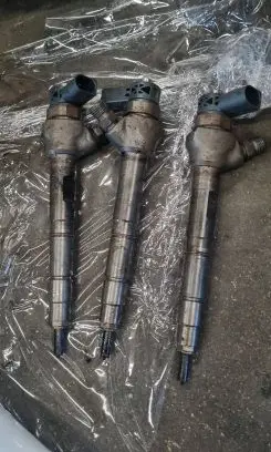 Volkswagen PASSAT CC Fuel injector 03L130277J